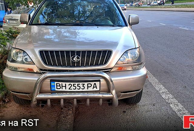 Бежевый Лексус РХ, объемом двигателя 3 л и пробегом 285 тыс. км за 6000 $, фото 1 на Automoto.ua