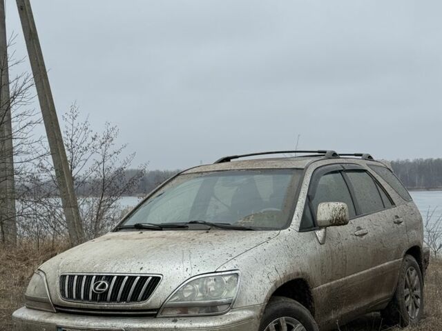 Бежевый Лексус РХ, объемом двигателя 3 л и пробегом 305 тыс. км за 4400 $, фото 1 на Automoto.ua