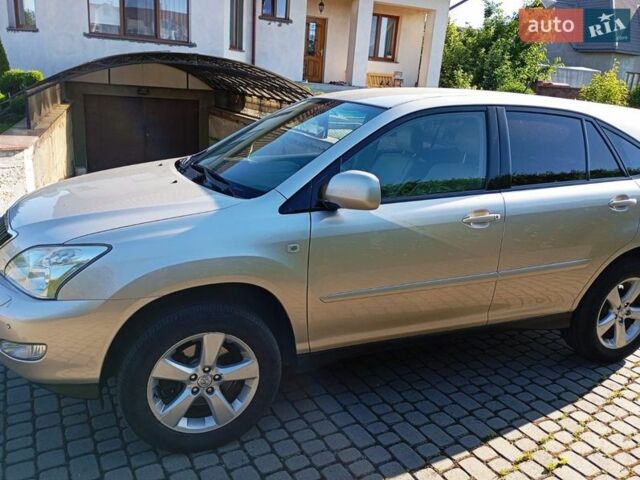 Бежевый Лексус РХ, объемом двигателя 3.3 л и пробегом 256 тыс. км за 8500 $, фото 1 на Automoto.ua