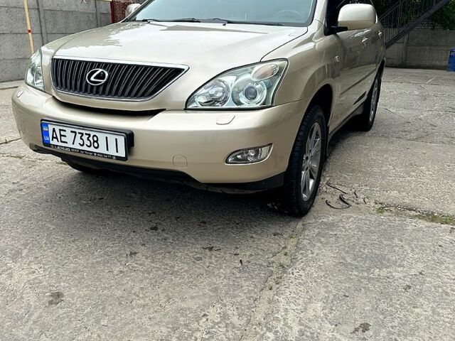 Бежевый Лексус РХ, объемом двигателя 3.5 л и пробегом 180 тыс. км за 12500 $, фото 1 на Automoto.ua
