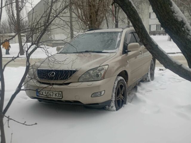 Бежевый Лексус РХ, объемом двигателя 3.5 л и пробегом 198 тыс. км за 10000 $, фото 1 на Automoto.ua
