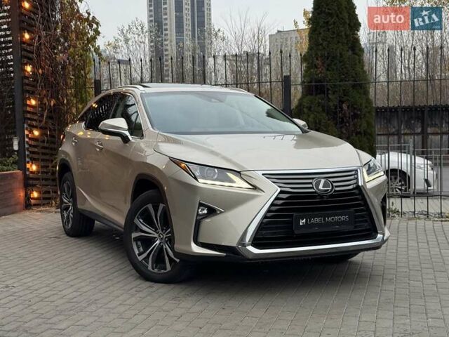 Бежевый Лексус РХ, объемом двигателя 3.46 л и пробегом 125 тыс. км за 34900 $, фото 1 на Automoto.ua