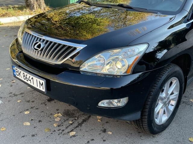 Черный Лексус РХ, объемом двигателя 3.5 л и пробегом 195 тыс. км за 13300 $, фото 1 на Automoto.ua