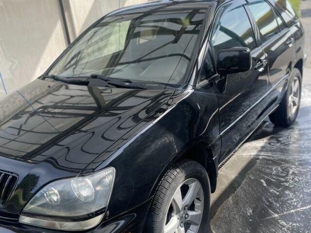 Чорний Лексус РХ, об'ємом двигуна 3 л та пробігом 310 тис. км за 6577 $, фото 1 на Automoto.ua