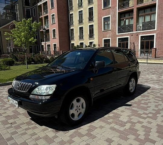 Чорний Лексус РХ, об'ємом двигуна 3 л та пробігом 228 тис. км за 7600 $, фото 1 на Automoto.ua