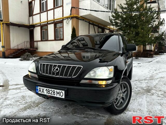 Черный Лексус РХ, объемом двигателя 3 л и пробегом 398 тыс. км за 5999 $, фото 1 на Automoto.ua