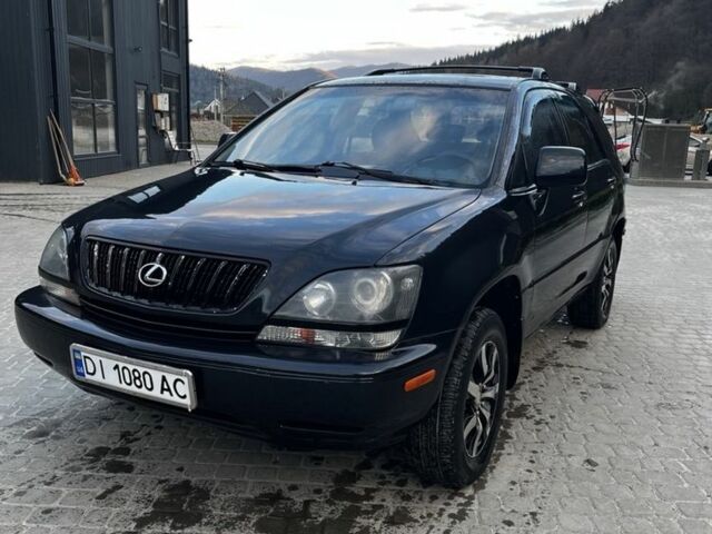 Черный Лексус РХ, объемом двигателя 3 л и пробегом 230 тыс. км за 4900 $, фото 1 на Automoto.ua