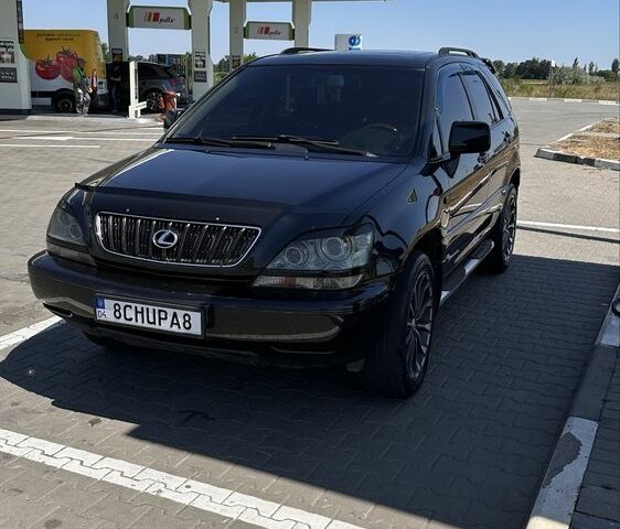 Чорний Лексус РХ, об'ємом двигуна 3 л та пробігом 280 тис. км за 7061 $, фото 1 на Automoto.ua