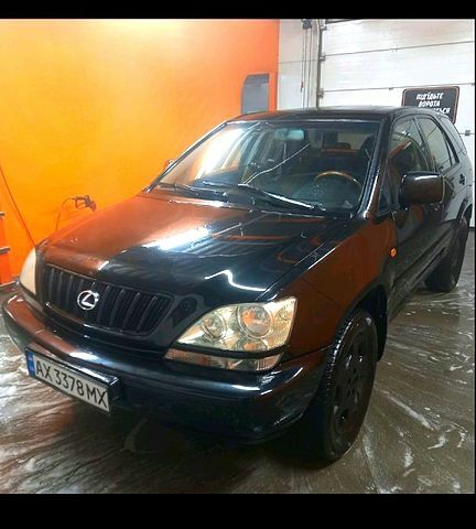 Чорний Лексус РХ, об'ємом двигуна 30 л та пробігом 300 тис. км за 7000 $, фото 1 на Automoto.ua