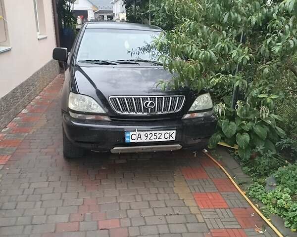 Черный Лексус РХ, объемом двигателя 3 л и пробегом 326 тыс. км за 5900 $, фото 1 на Automoto.ua