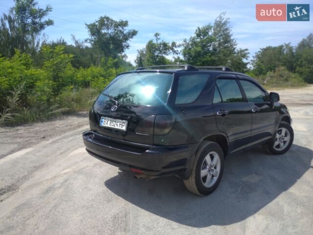 Чорний Лексус РХ, об'ємом двигуна 3 л та пробігом 324 тис. км за 8500 $, фото 1 на Automoto.ua