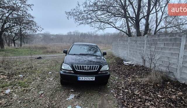 Черный Лексус РХ, объемом двигателя 3 л и пробегом 262 тыс. км за 7500 $, фото 1 на Automoto.ua