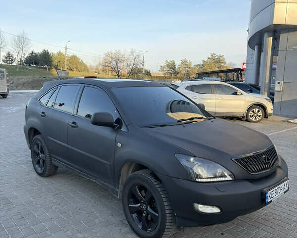 Черный Лексус РХ, объемом двигателя 3 л и пробегом 248 тыс. км за 5999 $, фото 1 на Automoto.ua
