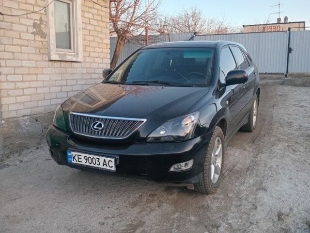 Черный Лексус РХ, объемом двигателя 3 л и пробегом 250 тыс. км за 5999 $, фото 1 на Automoto.ua