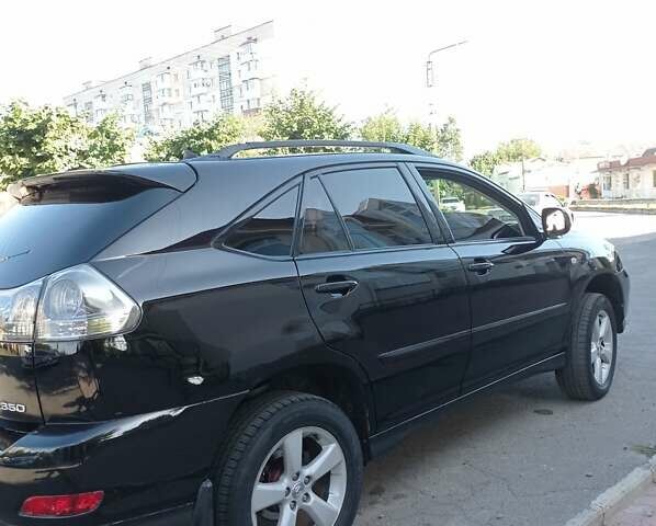 Черный Лексус РХ, объемом двигателя 3 л и пробегом 267 тыс. км за 10000 $, фото 1 на Automoto.ua