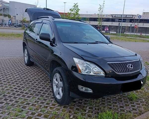 Чорний Лексус РХ, об'ємом двигуна 3.31 л та пробігом 200 тис. км за 10000 $, фото 1 на Automoto.ua
