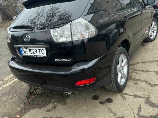 Черный Лексус РХ, объемом двигателя 3 л и пробегом 280 тыс. км за 9500 $, фото 1 на Automoto.ua