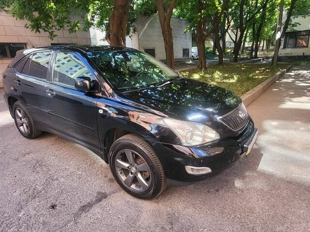 Черный Лексус РХ, объемом двигателя 3 л и пробегом 312 тыс. км за 9900 $, фото 1 на Automoto.ua