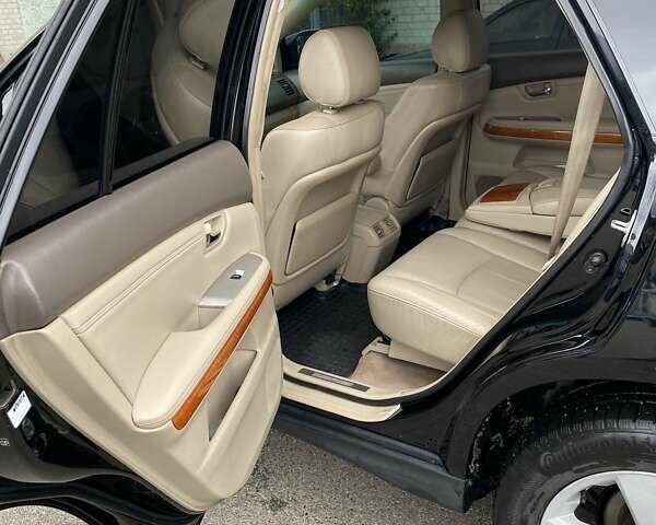Черный Лексус РХ, объемом двигателя 3.31 л и пробегом 280 тыс. км за 7500 $, фото 1 на Automoto.ua