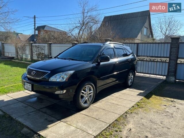 Черный Лексус РХ, объемом двигателя 3.3 л и пробегом 230 тыс. км за 10000 $, фото 1 на Automoto.ua