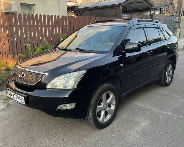 Черный Лексус РХ, объемом двигателя 3.31 л и пробегом 282 тыс. км за 10000 $, фото 1 на Automoto.ua