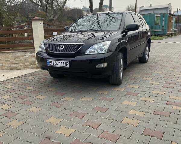 Черный Лексус РХ, объемом двигателя 3 л и пробегом 196 тыс. км за 9700 $, фото 1 на Automoto.ua