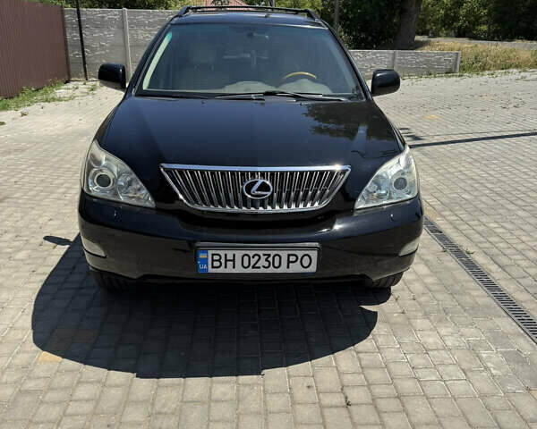 Черный Лексус РХ, объемом двигателя 3.46 л и пробегом 185 тыс. км за 10000 $, фото 1 на Automoto.ua