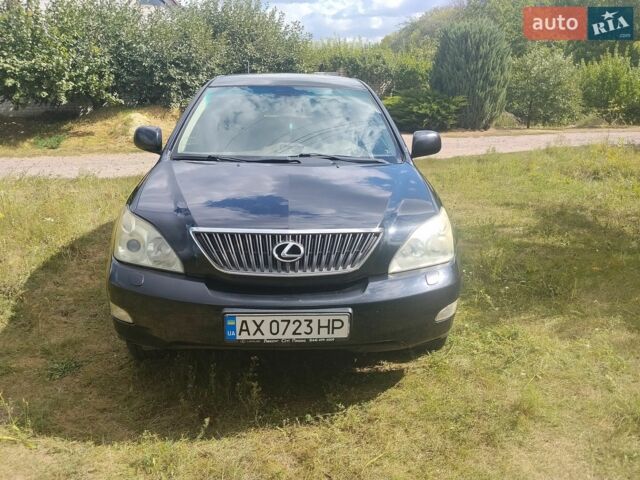 Чорний Лексус РХ, об'ємом двигуна 3.46 л та пробігом 265 тис. км за 12000 $, фото 1 на Automoto.ua
