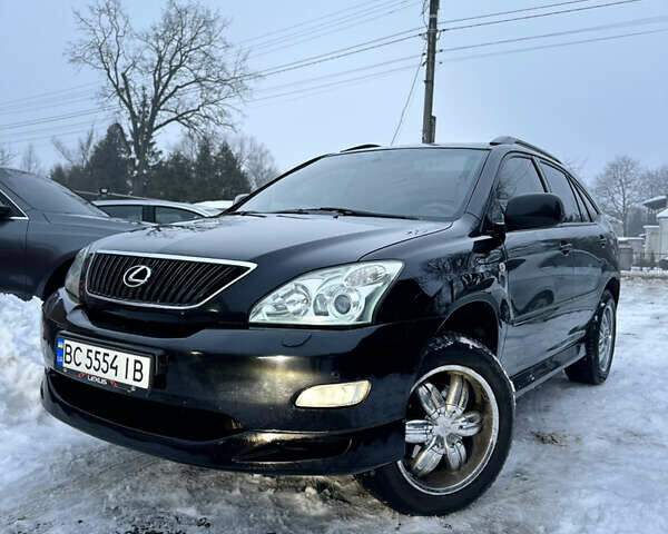 Черный Лексус РХ, объемом двигателя 3.5 л и пробегом 306 тыс. км за 11300 $, фото 1 на Automoto.ua