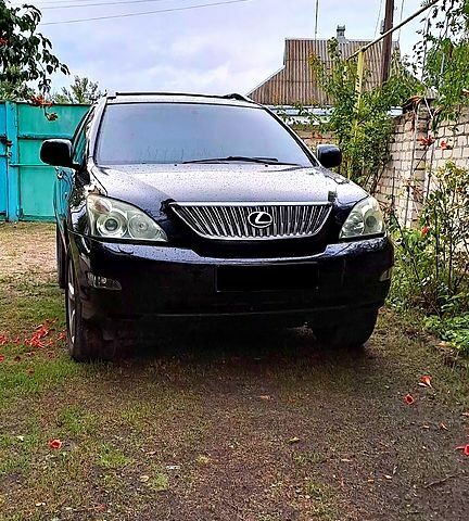 Черный Лексус РХ, объемом двигателя 3.5 л и пробегом 200 тыс. км за 17000 $, фото 1 на Automoto.ua