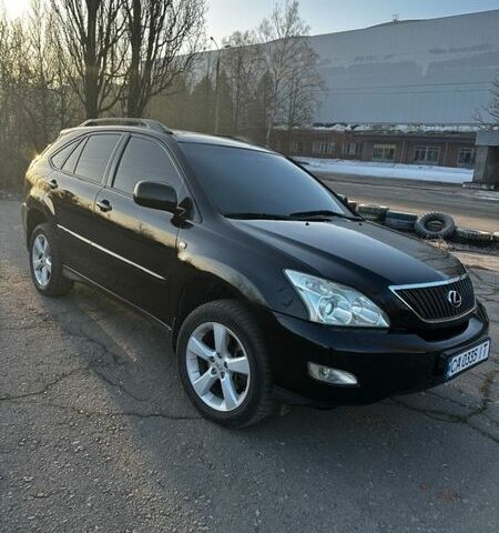 Чорний Лексус РХ, об'ємом двигуна 3.46 л та пробігом 200 тис. км за 11200 $, фото 1 на Automoto.ua