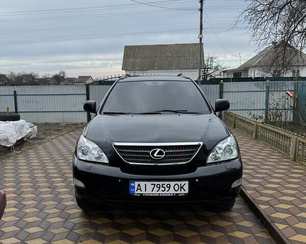 Черный Лексус РХ, объемом двигателя 3.5 л и пробегом 270 тыс. км за 10000 $, фото 1 на Automoto.ua