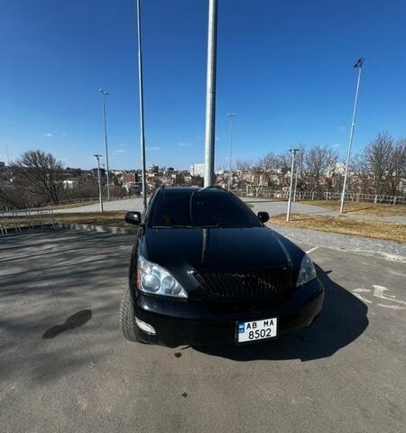 Черный Лексус РХ, объемом двигателя 3.46 л и пробегом 250 тыс. км за 11000 $, фото 1 на Automoto.ua