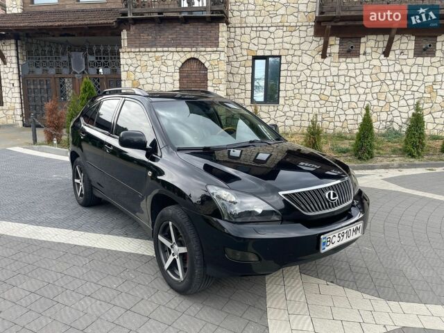 Чорний Лексус РХ, об'ємом двигуна 3.46 л та пробігом 235 тис. км за 10800 $, фото 1 на Automoto.ua
