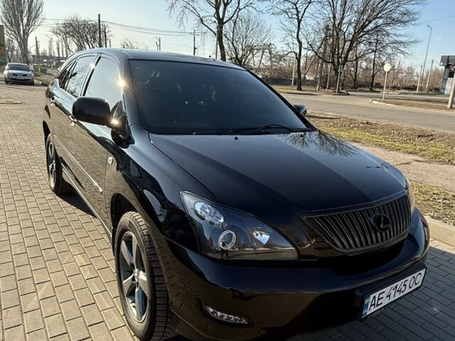 Черный Лексус РХ, объемом двигателя 3.5 л и пробегом 295 тыс. км за 11500 $, фото 1 на Automoto.ua