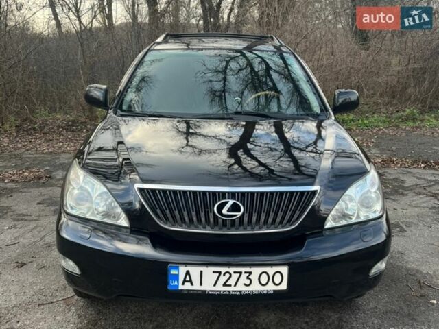 Черный Лексус РХ, объемом двигателя 3.46 л и пробегом 240 тыс. км за 11700 $, фото 1 на Automoto.ua