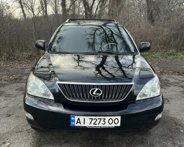 Черный Лексус РХ, объемом двигателя 3.46 л и пробегом 224 тыс. км за 12500 $, фото 1 на Automoto.ua