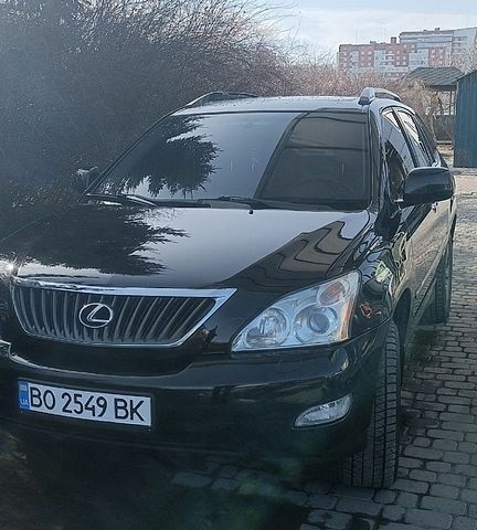 Черный Лексус РХ, объемом двигателя 3.5 л и пробегом 240 тыс. км за 12000 $, фото 1 на Automoto.ua