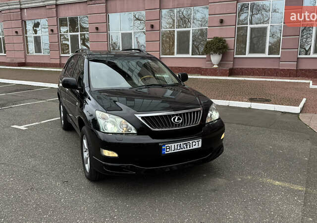 Черный Лексус РХ, объемом двигателя 3.5 л и пробегом 200 тыс. км за 11400 $, фото 1 на Automoto.ua