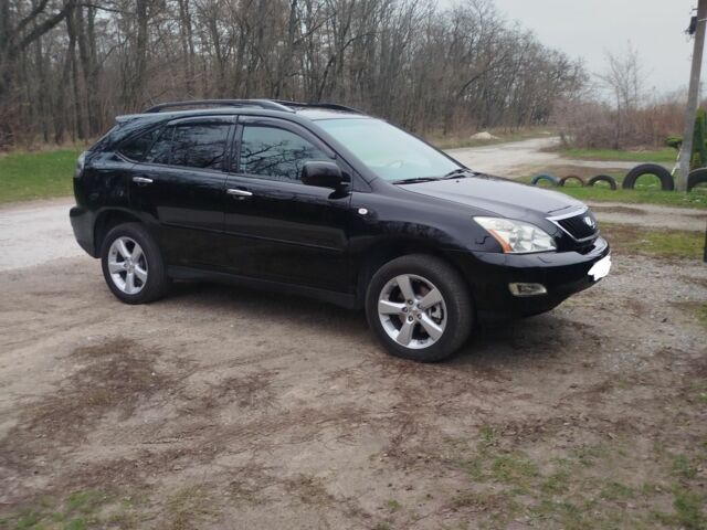 Чорний Лексус РХ, об'ємом двигуна 3.5 л та пробігом 320 тис. км за 11400 $, фото 1 на Automoto.ua