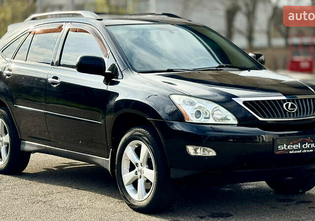 Черный Лексус РХ, объемом двигателя 3.46 л и пробегом 254 тыс. км за 9499 $, фото 1 на Automoto.ua