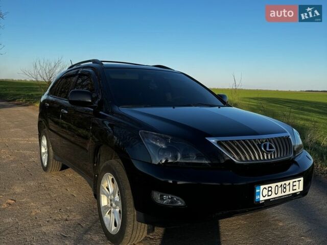 Черный Лексус РХ, объемом двигателя 3.46 л и пробегом 239 тыс. км за 11999 $, фото 1 на Automoto.ua