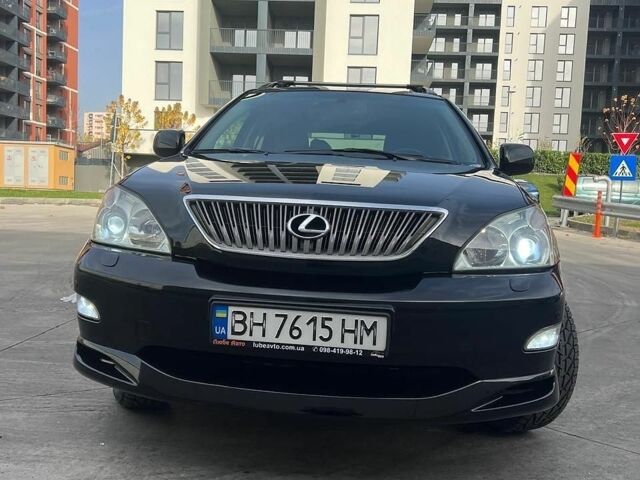 Черный Лексус РХ, объемом двигателя 3.46 л и пробегом 220 тыс. км за 13999 $, фото 1 на Automoto.ua