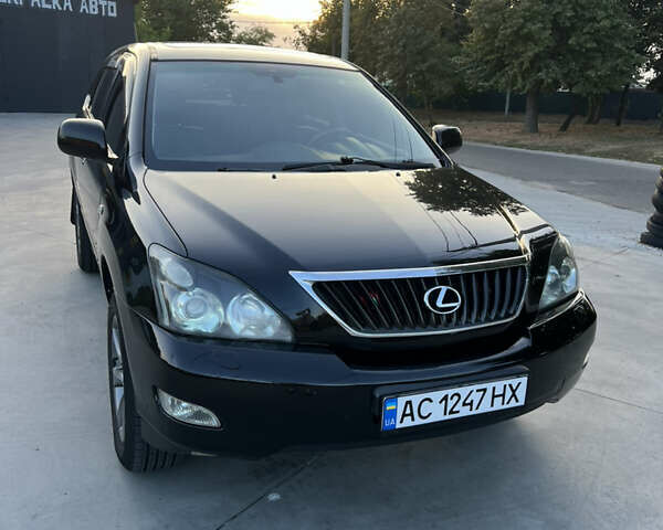 Чорний Лексус РХ, об'ємом двигуна 3.46 л та пробігом 205 тис. км за 10800 $, фото 1 на Automoto.ua