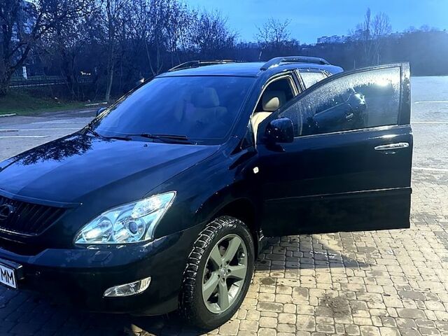 Чорний Лексус РХ, об'ємом двигуна 3.5 л та пробігом 167 тис. км за 12000 $, фото 1 на Automoto.ua