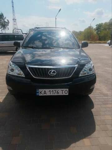 Черный Лексус РХ, объемом двигателя 3.46 л и пробегом 262 тыс. км за 15000 $, фото 1 на Automoto.ua