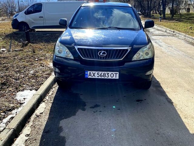 Черный Лексус РХ, объемом двигателя 3.5 л и пробегом 248 тыс. км за 12500 $, фото 1 на Automoto.ua