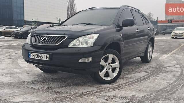 Чорний Лексус РХ, об'ємом двигуна 3.46 л та пробігом 195 тис. км за 12700 $, фото 1 на Automoto.ua
