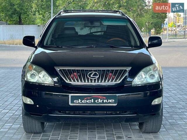 Черный Лексус РХ, объемом двигателя 3.5 л и пробегом 138 тыс. км за 12999 $, фото 1 на Automoto.ua