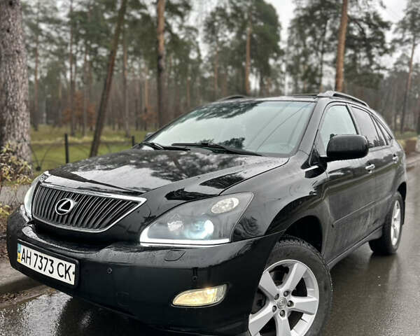 Черный Лексус РХ, объемом двигателя 3.46 л и пробегом 273 тыс. км за 12300 $, фото 1 на Automoto.ua